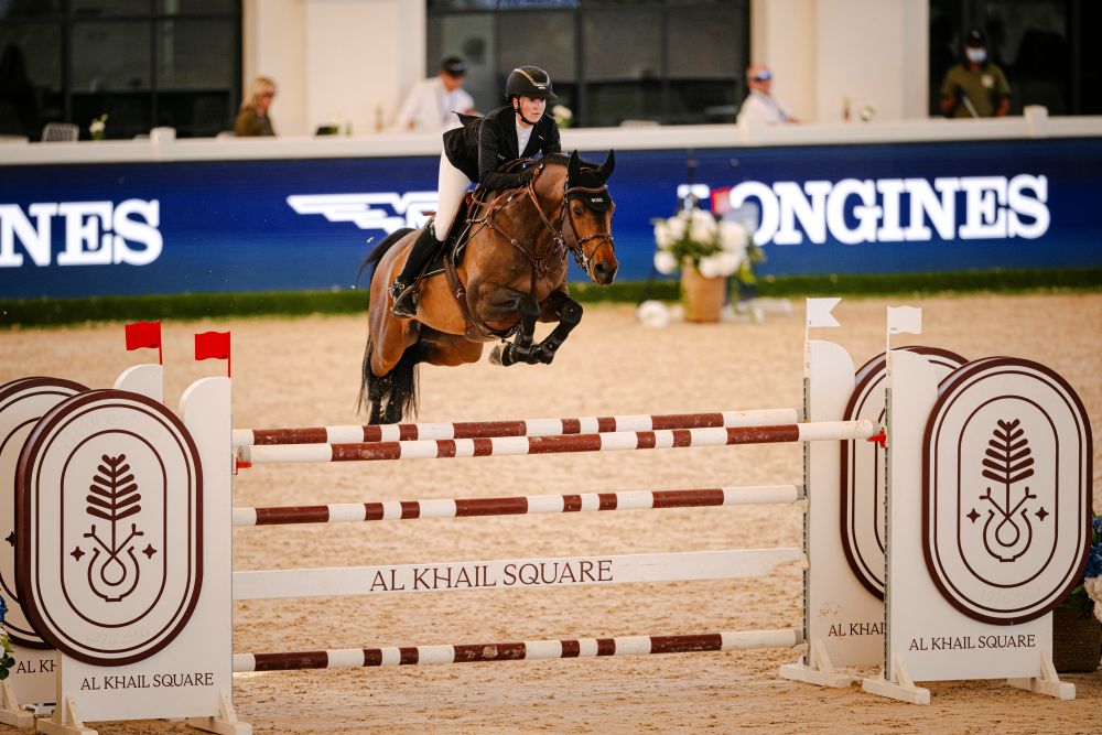 Team rider competing at a high level.